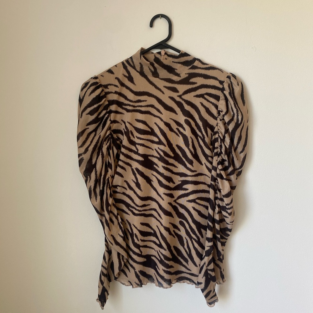 Animal print long sleeve mock neck top